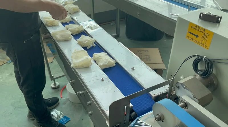 Products reaching the packing area faster than the process can handle